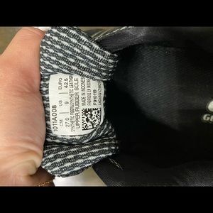 ASICS black man running shoes